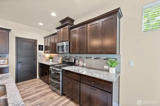 open concept living downstairs with two oversized, massive sliding doors