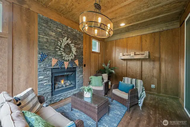 Massive slider opens to a Covered and 3/4 framed in back deck with outdoor fireplace and wired for a tv!