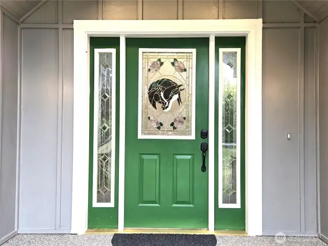 Beautiful custom stained glass window in door.