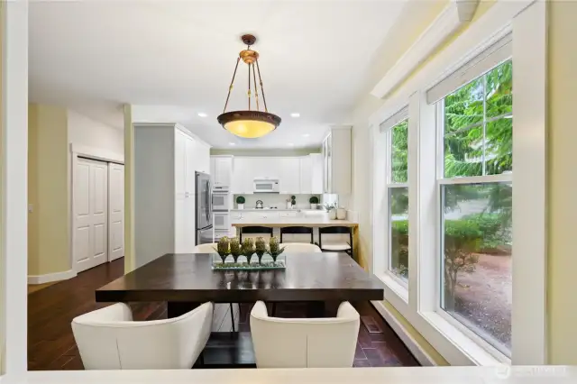 Defined dining space seamlessly open to the kitchen, creating a functional and inviting layout for everyday living and entertaining.
