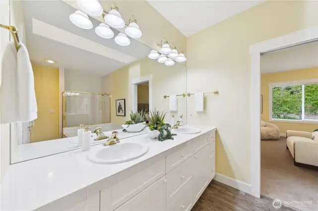 The primary bathroom features double sinks for added convenience and functionality.