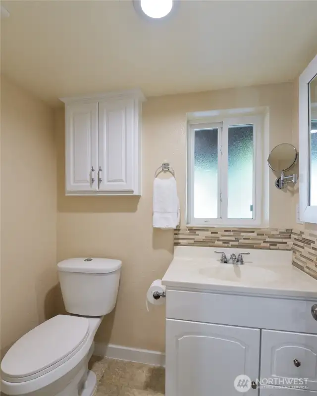 Downstairs 3/4 bath with shower to the back