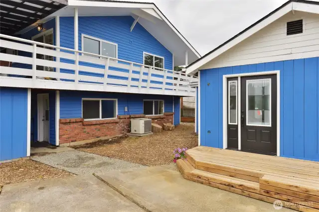 Back of house showing lower entrance and studio rental