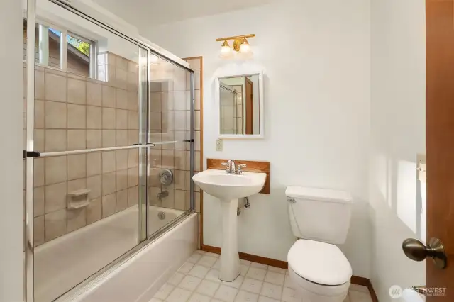 spacious main floor bathroom off the main floor bedroom