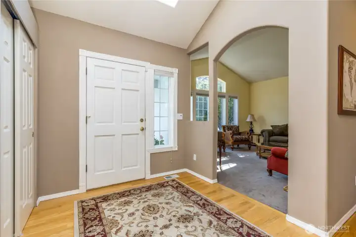 Spacious foyer with a bright skylight
