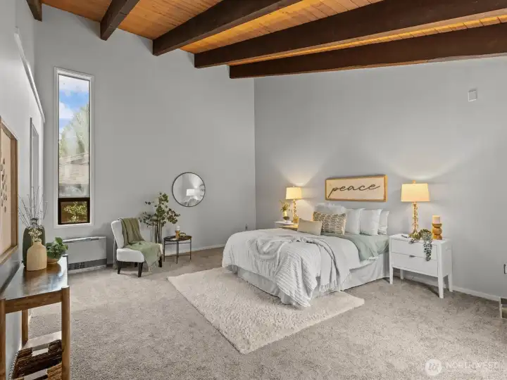 Rounding out the main floor is the oversized primary bedroom where you'll be able to wake up to the views of the backyard.