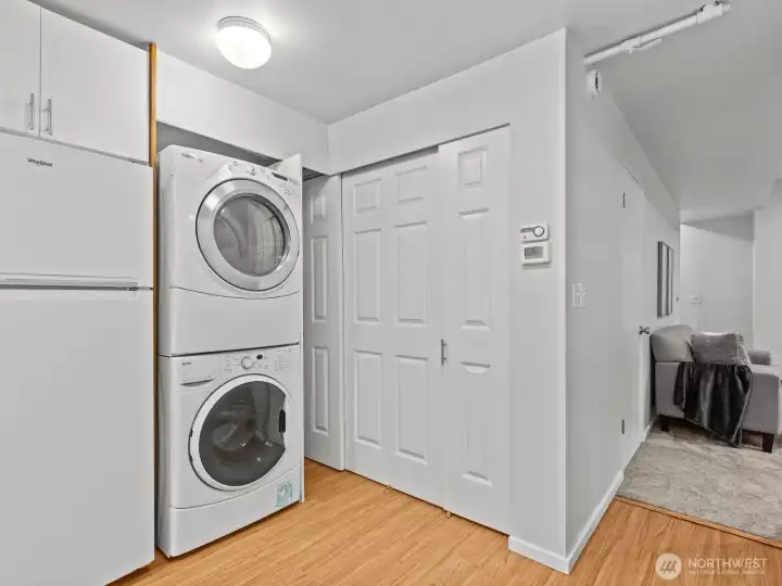There's even a 2nd laundry area. The furnace and water heater are hidden behind the closet doors.