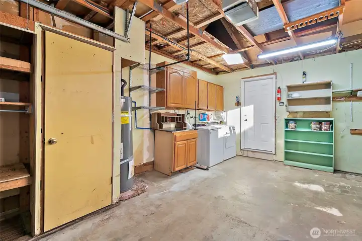 Garage has washer/dryer, new hot water heater and lots of storage space.
