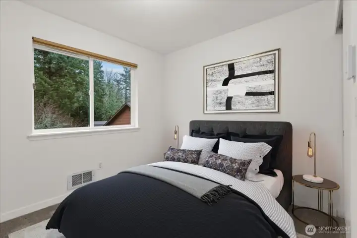 This bedroom has been virtually staged.