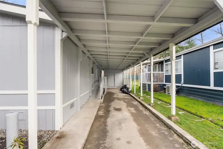 oversized tandem carport for two vehicles, and a rear storage shed