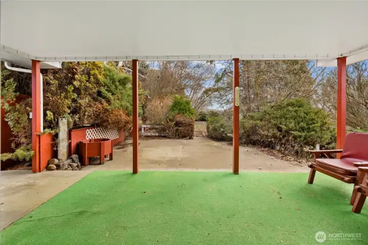Covered patio on the east side of the house