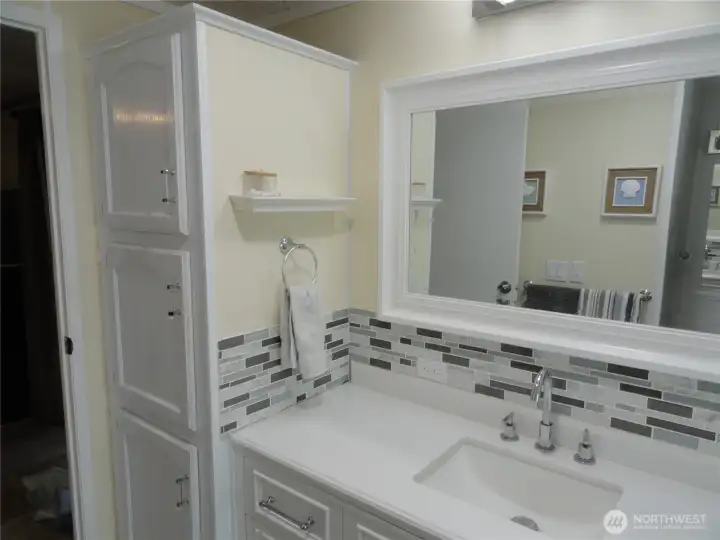 A lot of storage in the bathroom as well!  Large mirror!