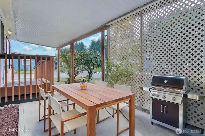 View of your covered porch and ramp, so much space to entertain or do your gardening! ***Virtually Staged***
