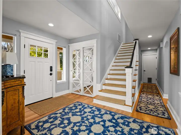 Bright classy colors and white trim is a great contrast to the hardwood floors.