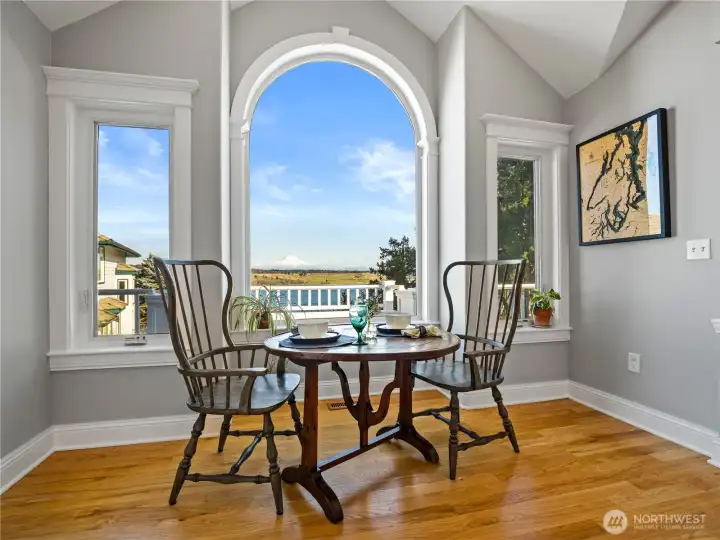 This lovely nook right off the kitchen is a great place to have breakfast, do homework, or play a game.
