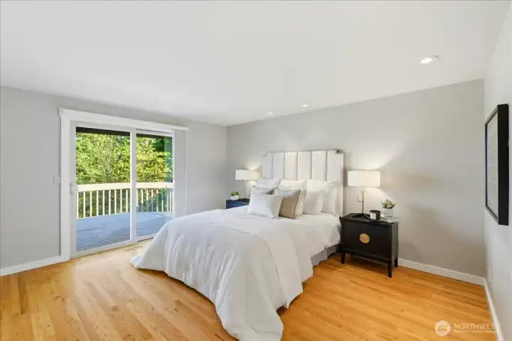 Primary suite - access directly to the deck for watching beautiful morning sunrises