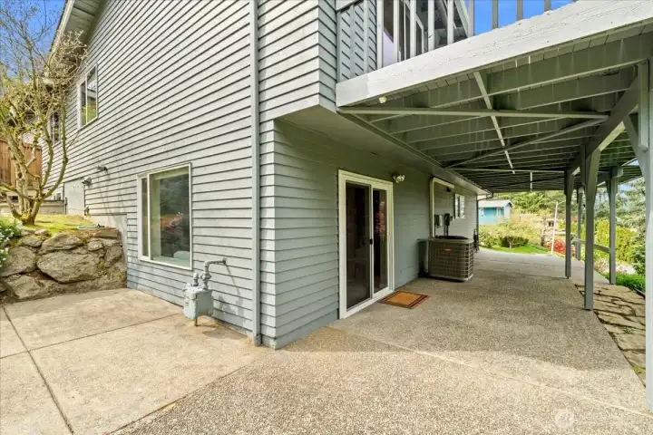 Lower level patio with level entry from the driveway - great entry option for guests with mobility challenges