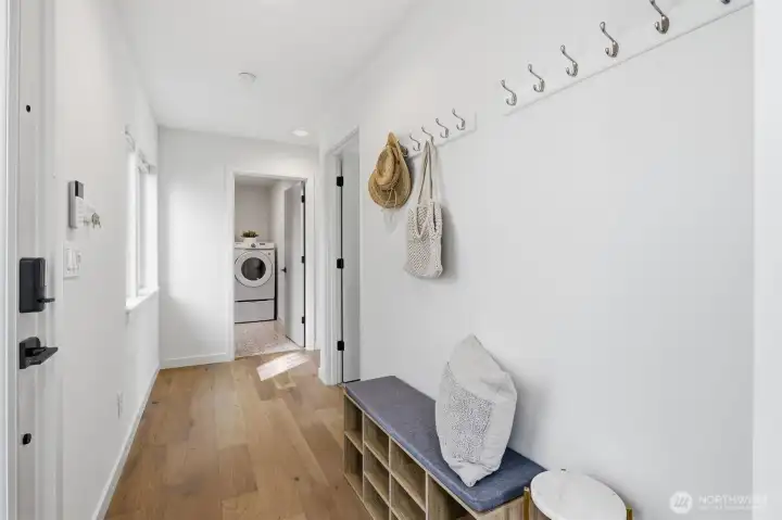 A view from the entry looking towards the bedrooms and laundry room.
