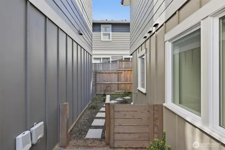This side yard is yours to leave at low maintenance or add your favorite plantings!