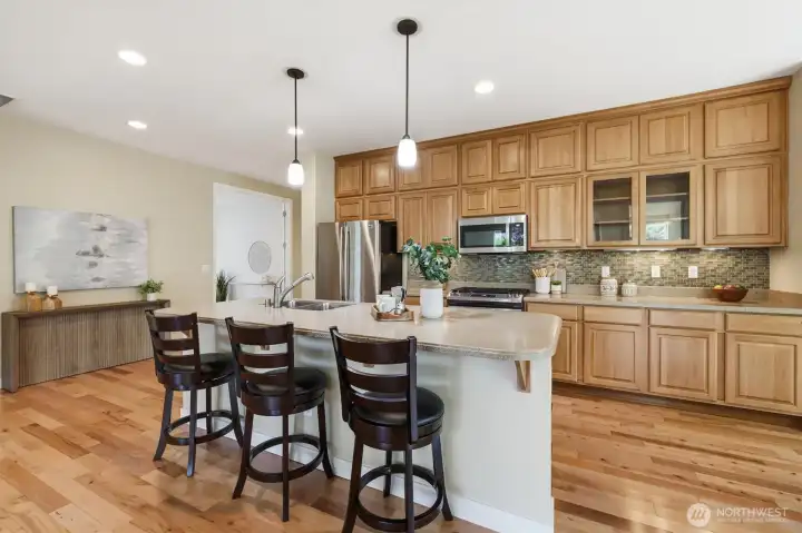 The multi-use island is the perfect spot to chat with the cook and also provides a wonderful space to grab a quick bite. The multi-use island is the perfect spot to chat with the cook and also provides a wonderful space to grab a quick bite.