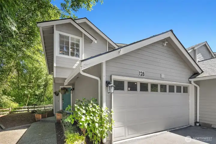 Unit 128 is the last home in the Forest Isle complex, so furthest from the road, and is also an end unit. An end unit provides a number of additional windows that other units in the complex do not have. The home features an attached 2-car garage + driveway parking.