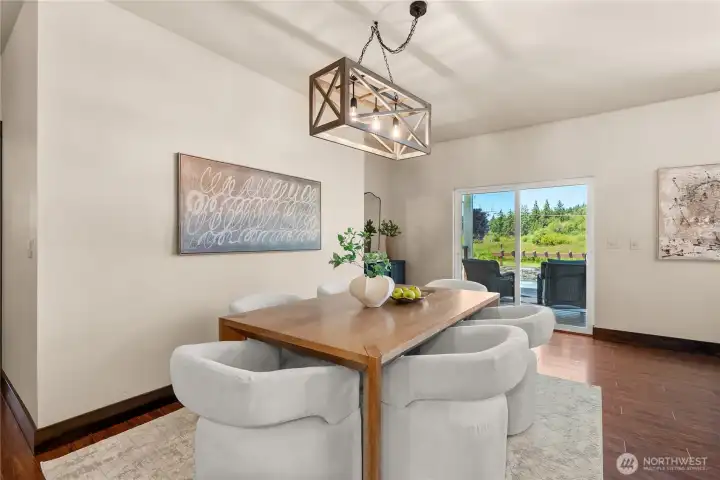 Dining Room w/ easy access to covered outdoor deck and pool area.