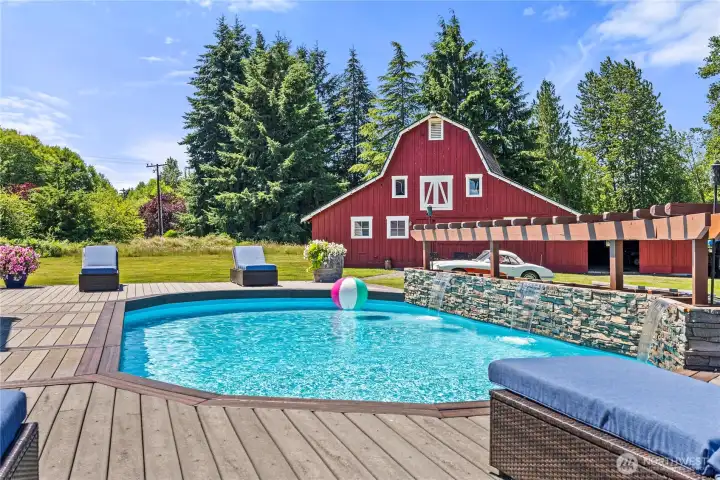 Waterfalls and Views! Pool is heated and features a deep end.