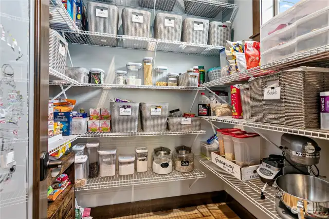 Walk in pantry w/tons of shelving & power outlets