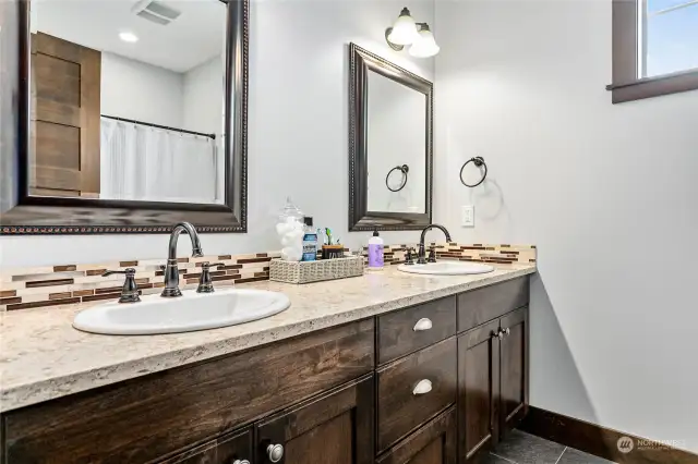 Upstairs full bath is huge w/dual vanity sink & quartz countertops