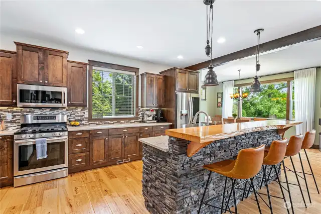 Large window in heart of kitchen w/beautiful view of tree line