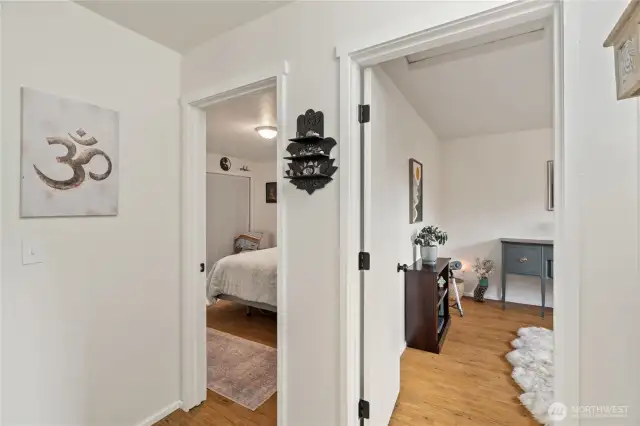 Hallway between primary bedroom and guest bedroom