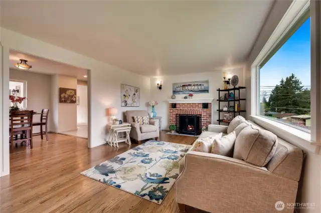 Living Room Features Wood Burning Fireplace