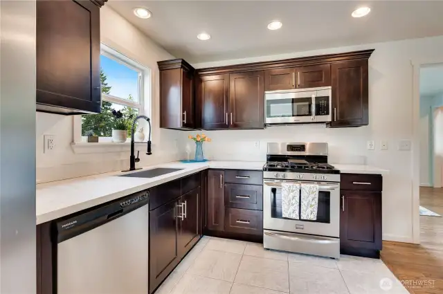 Kitchen Overlooks Side Yard and is Located Next to the Utility Room