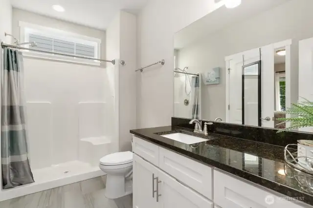 Downstairs 3/4 bath which is connected to full size bedroom