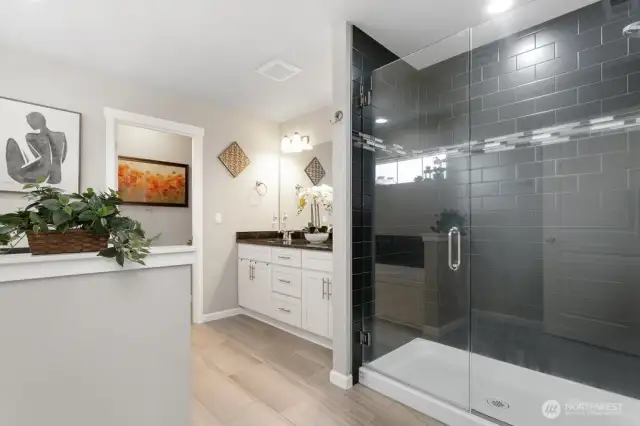 Gorgeous design primary bath. With separate tub and large shower. Double sink on quartz
