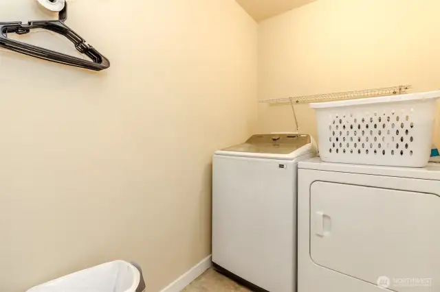 Convenient upstairs laundry.