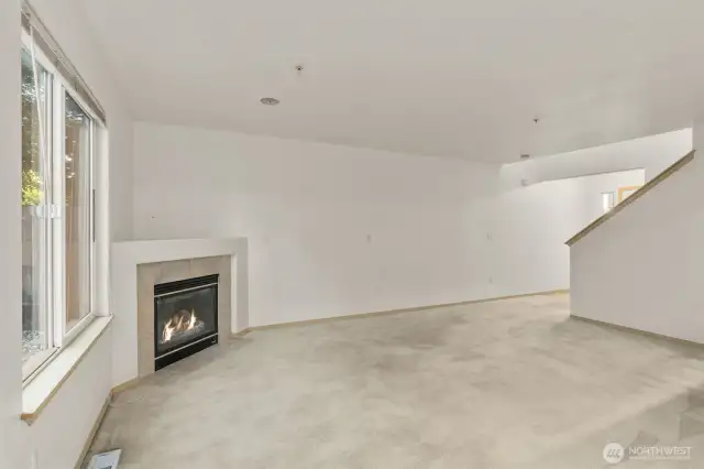 Open concept design connects living room, dining room and kitchen.