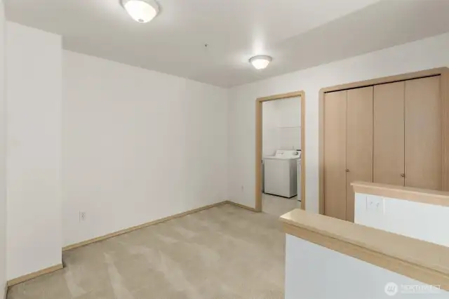 Spacious landing area can flex as a work space. Large laundry room adjacent to all rooms for convenience.