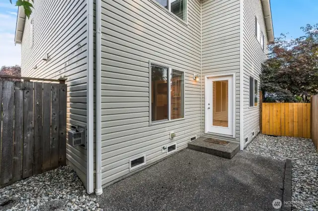 Back patio is fully fenced with access from inside or outside.