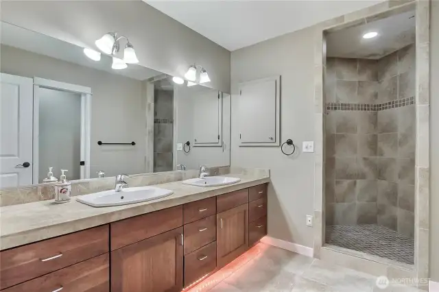Lower 3/4 guest/kids bath, generous in size and I love the under cabinet LED lighting and walk-in shower.