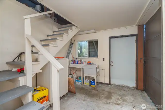 shops utility room, loft, 1/2 bath, office, and 3 bays.