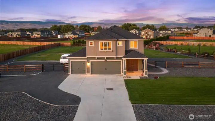 Well- maintained Palomino Home with 4 bedrooms, 3 baths plus 2 flex rooms and open concept chef's kitchen/great room/dining area