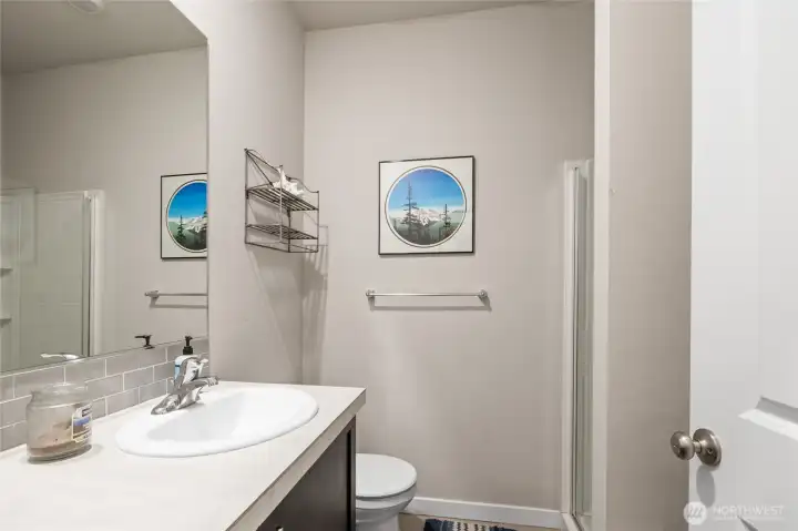 Main level 3/4 bath next to flex/office guest space