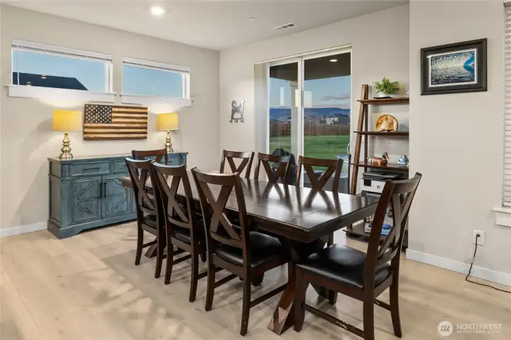Dining space and sliding door to your backyard oasis