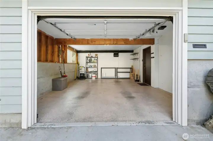Attached garage and driveway parking.