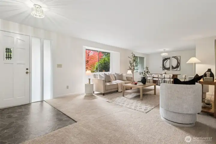 Step inside to bright, open living spaces filled with natural light. Large windows invite the outdoors in, creating a warm and airy atmosphere. Every room feels connected yet distinct, ideal for both entertaining and relaxing. Soft NEW carpet underfoot and neutral paint throughout create a serene atmosphere-ready for new owners!