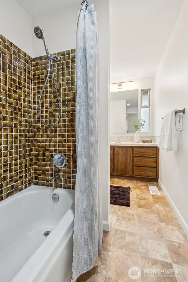 The hall Full bath features a spacious layout, making the most of the space. Fresh interior paint throughout the home.