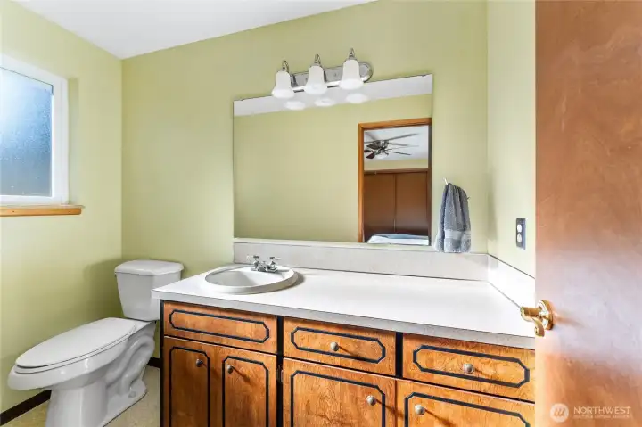 Primary bedroom half-bath