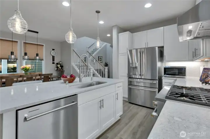 Upgraded Monogram stainless steel suite of appliances.