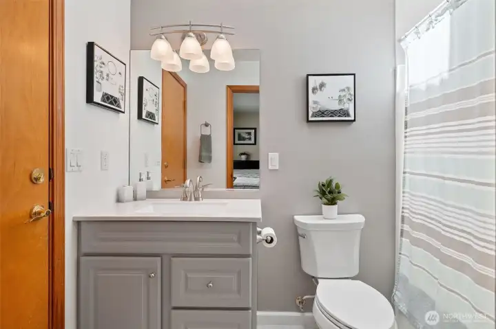 Bath off second Primary bedroom with door to the pool area.